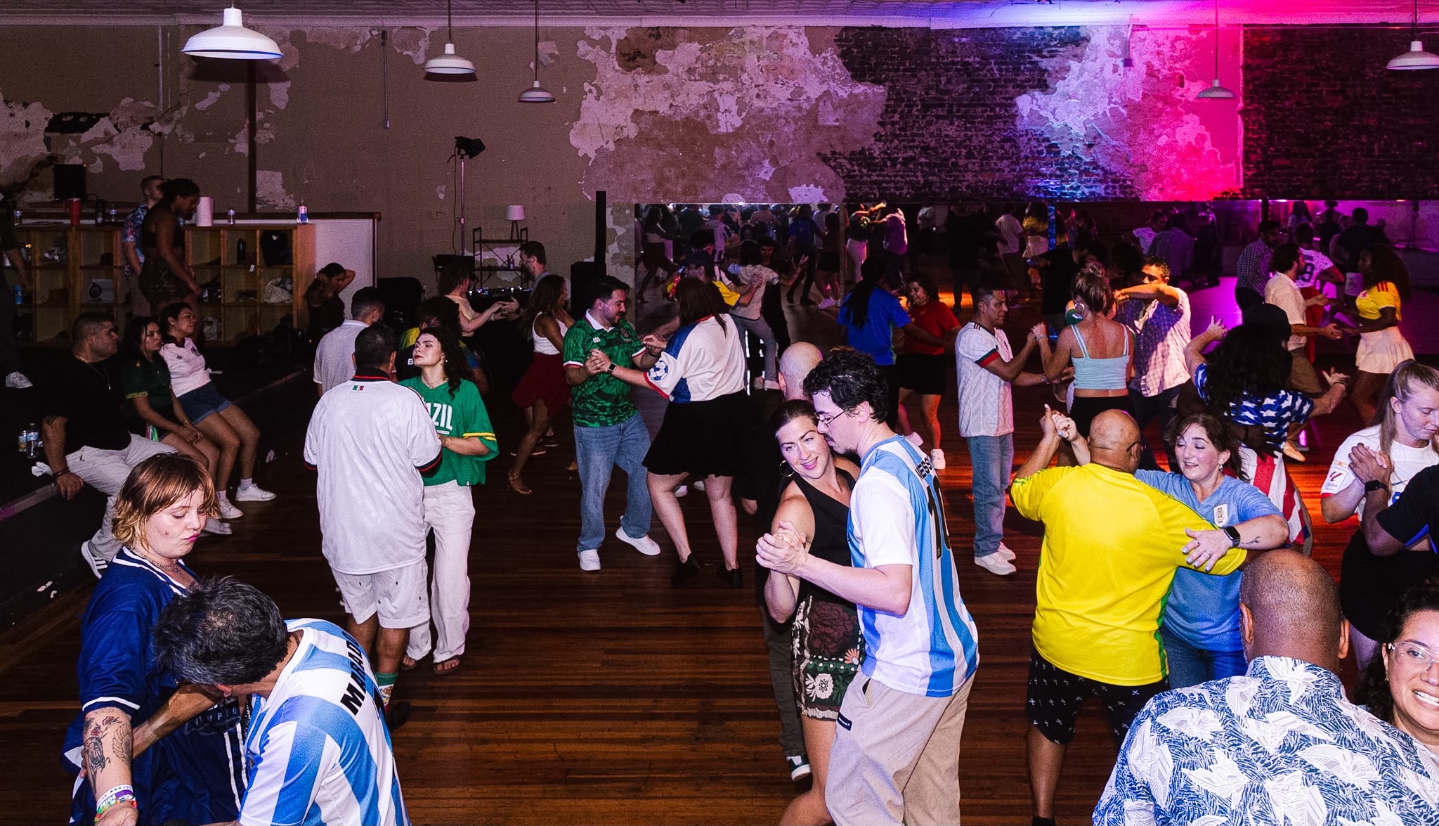 Salsa and bachata dancers enjoying a social event