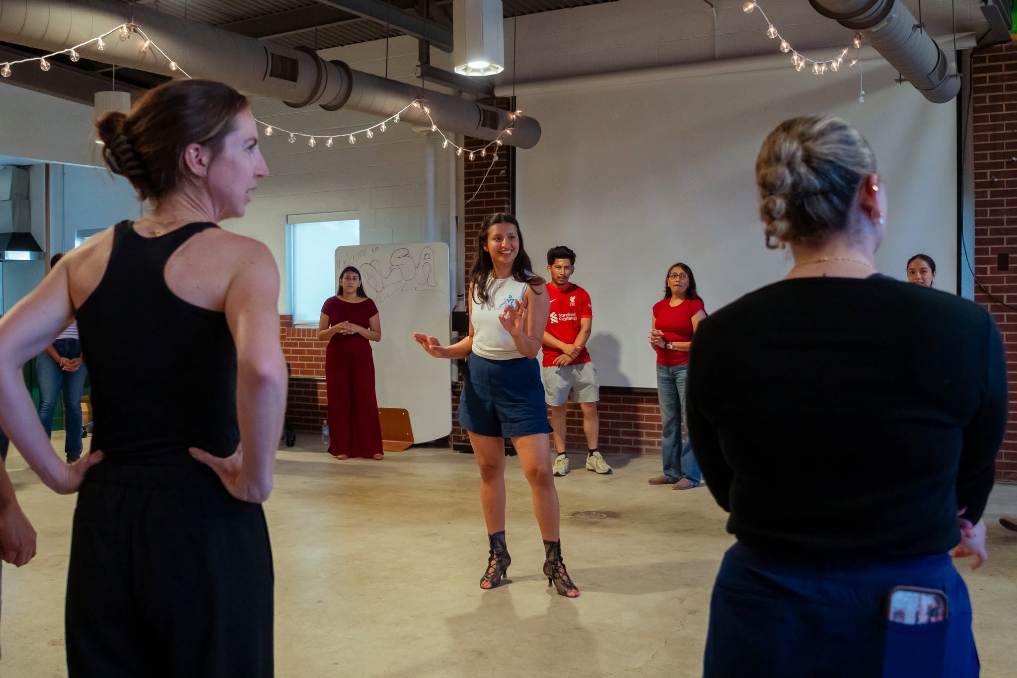 Sonia teaching a salsa and bachata dance class