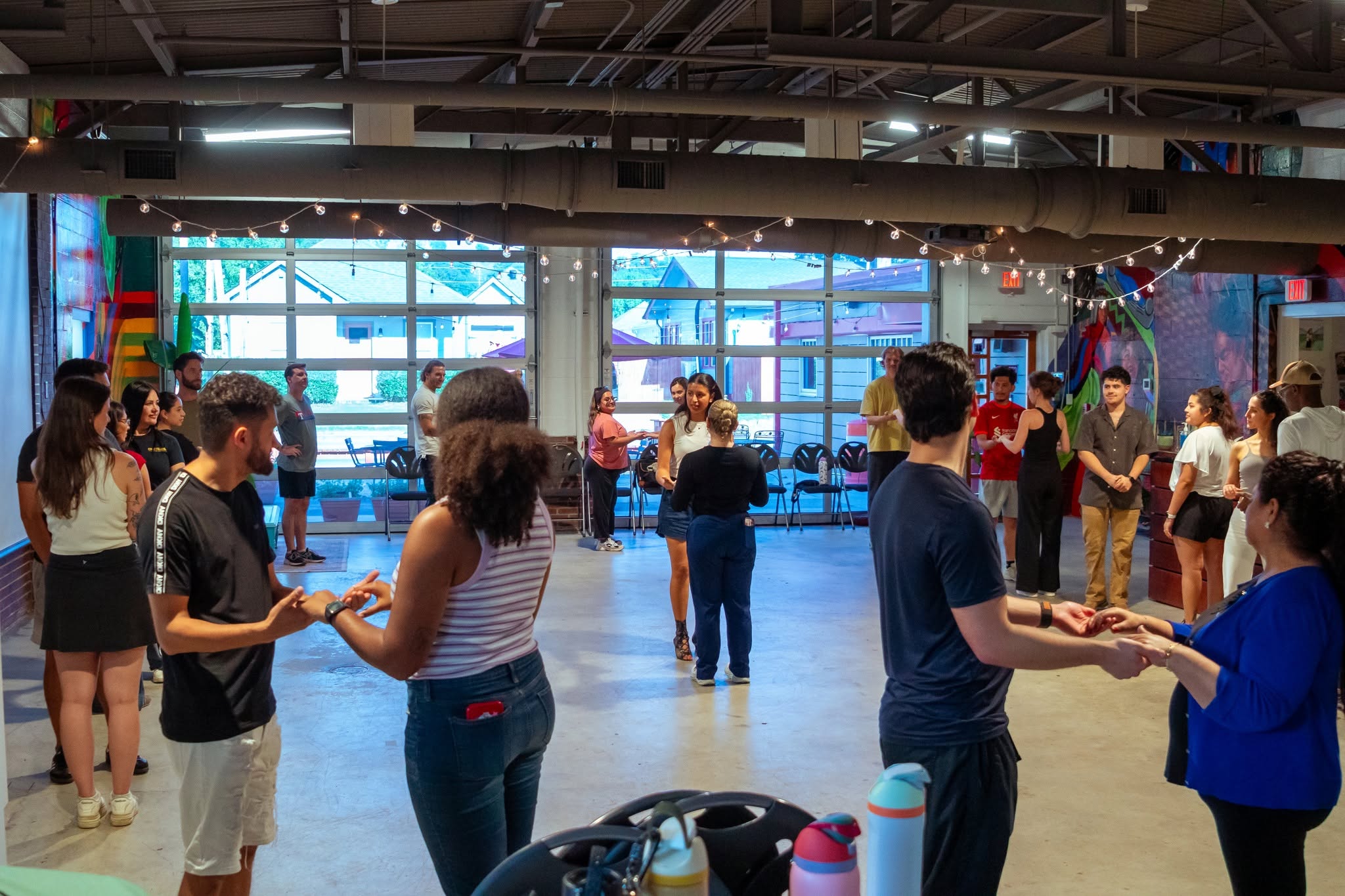 Salsa and bachata students learning with Sonia