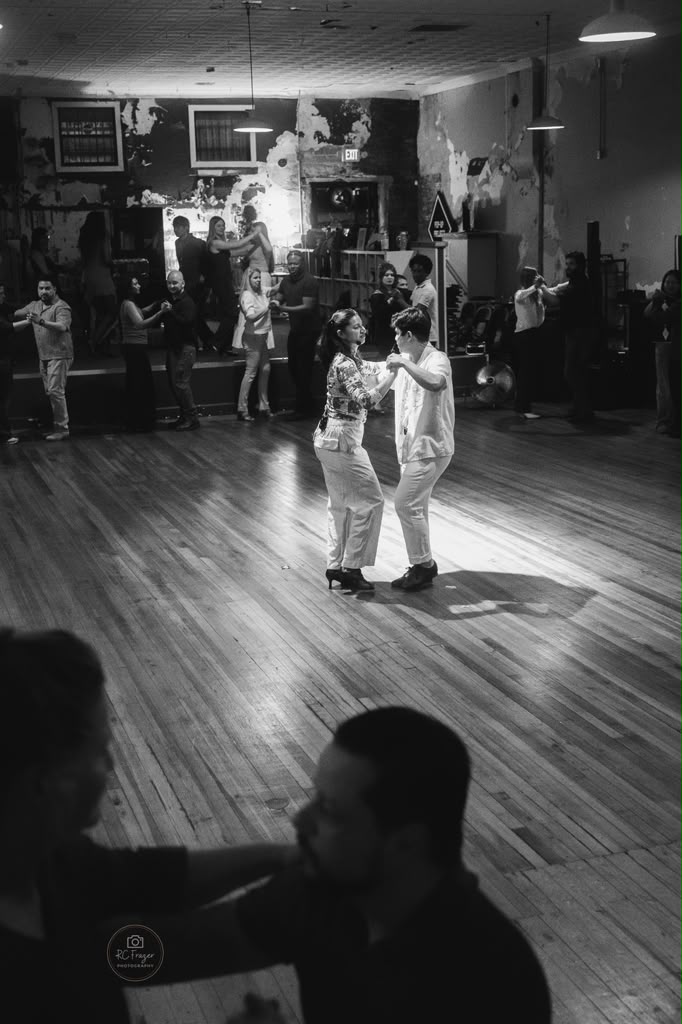 Students learning salsa and bachata dancing
